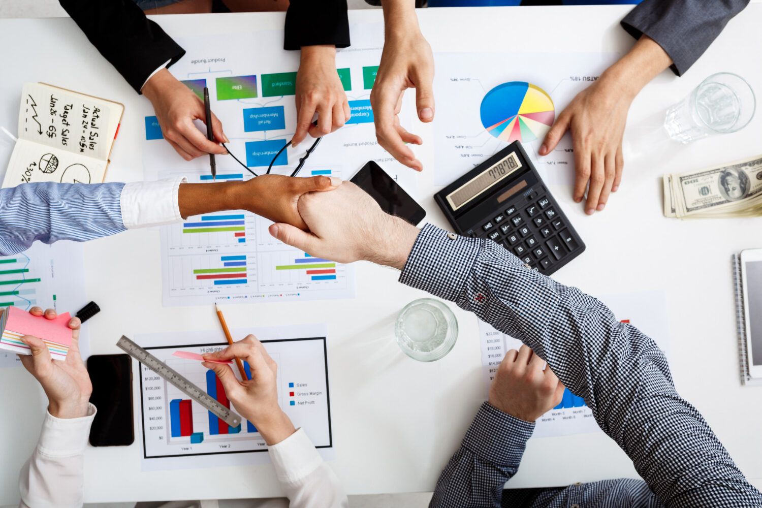Business team reviewing financial charts together